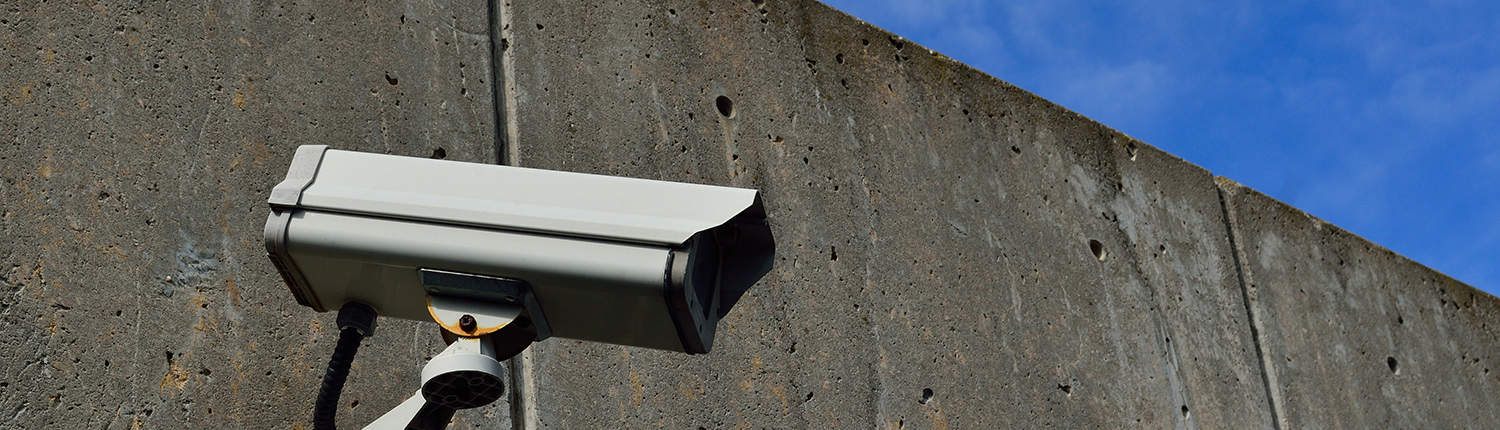 CCTV camera mounted on a concrete wall