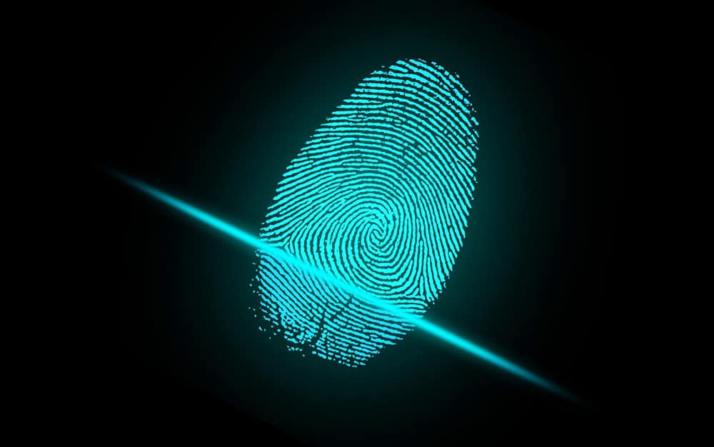 a fingerprint highlighted against a black background